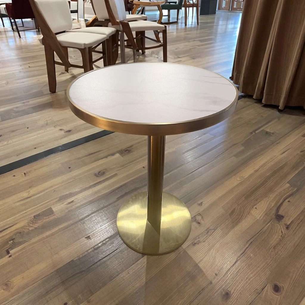 Modern round coffee table with marble top and metal frame