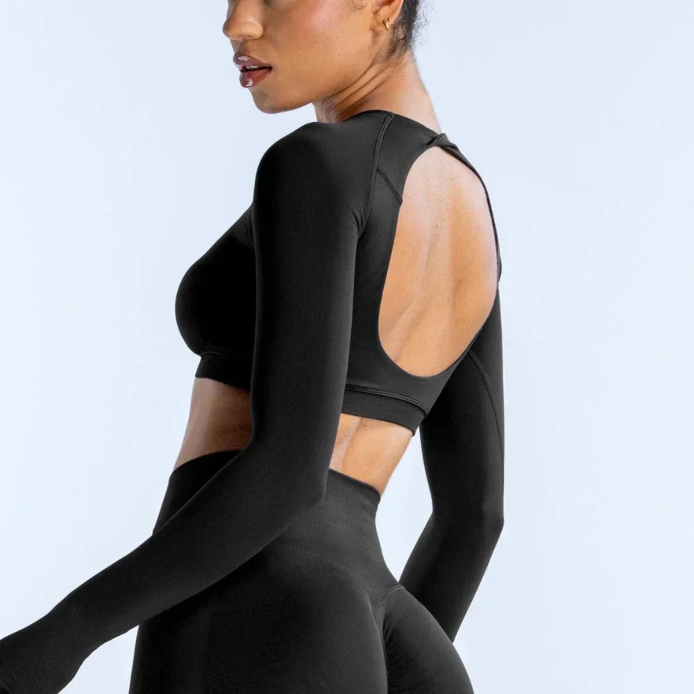 قميص قصير ديناميكي بأكمام طويلة للنساء مثير مفتوح الظهر لليوجا، قميص علوي للتمرين في صالة الألعاب الرياضية، قمصان رياضية بدون خياطة