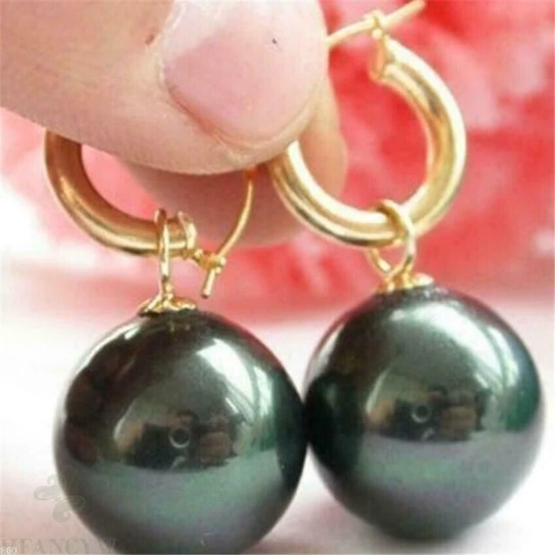 Massive AAAA 16mm perfectly round natural black Tahitian pearl 14K gold