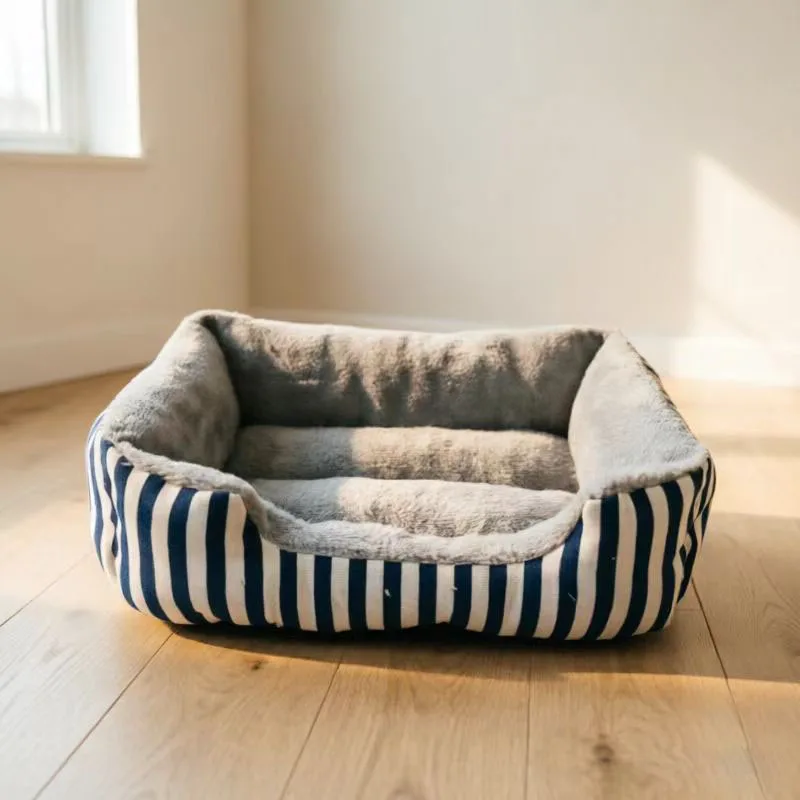 Cama para perro a rayas rectangular con borde acolchado todo el año