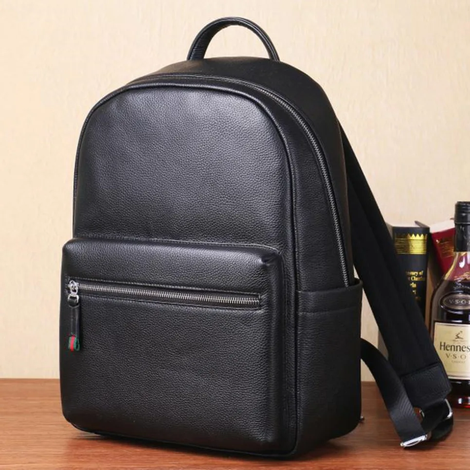 Mochilas de cuero genuino para hombre, morral de estudiante de cuero Natural auténtico, bolso de lujo para ordenador portátil, novedad de 2026