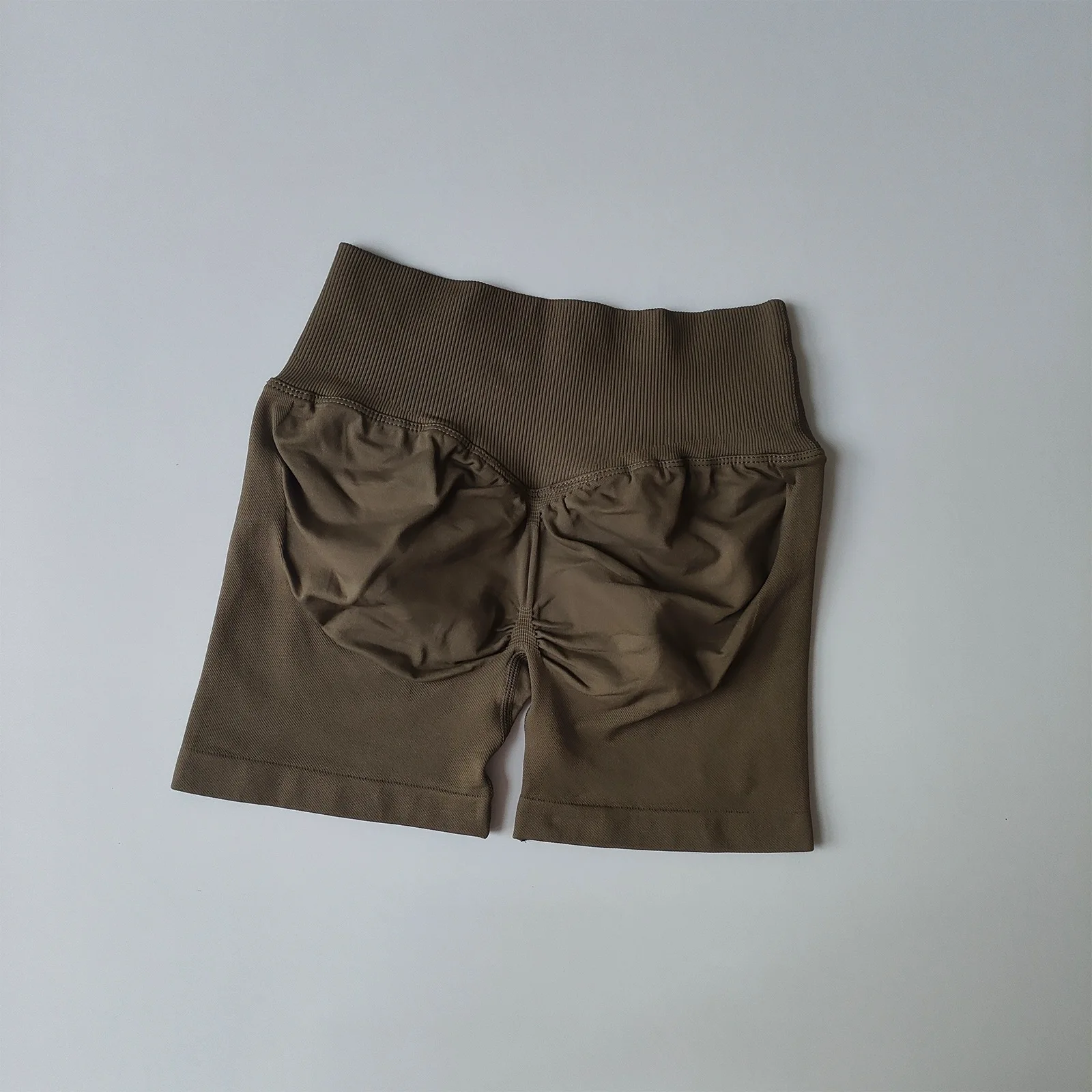 Damen-Sportshorts mit hoher Taille und Hüftlift-Effekt, pfirsichfarbene Po-Formung, eng anliegende, schnelltrocknende Lauf- und Trainingsshorts. – Detail 18