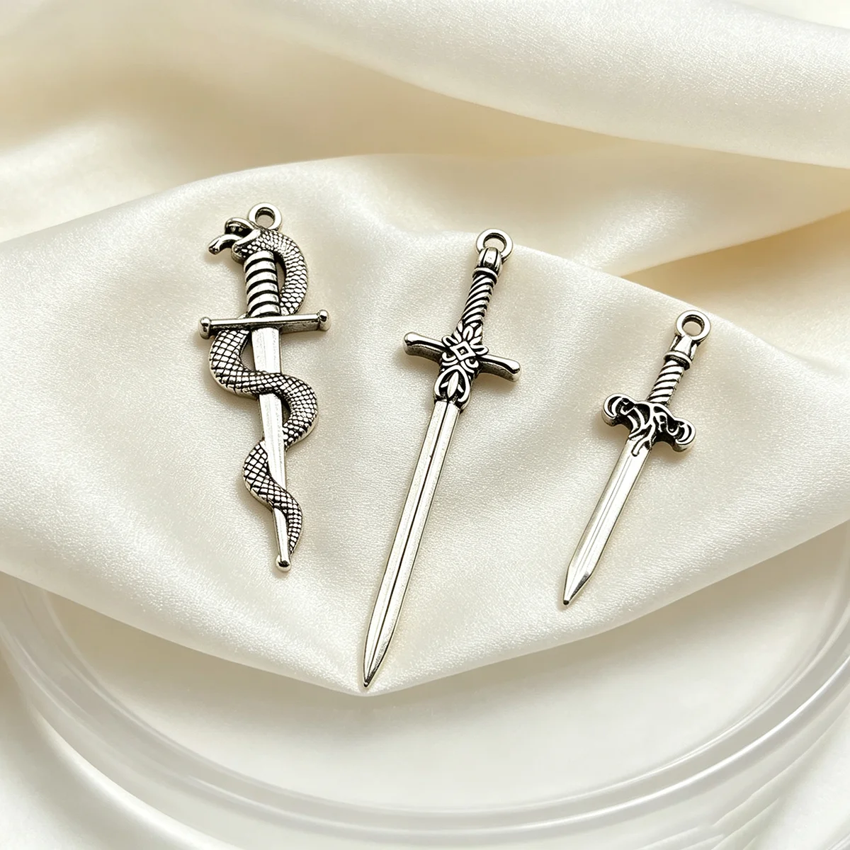 14-Piece Set of Snake-Shaped Long Swords, DIY Handmade Accessories, Including Coiled Snake Long Swords, Carved Handle Short Swords, Long Cross-Shaped Long Swords in Various Styles, Suitable for DIY Bracelets, Necklaces, Earrings, Pendants, and Handmade Beaded Decoration Accessories
