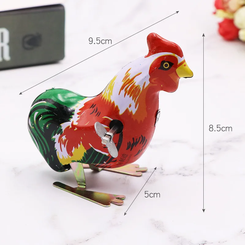 This is a classic spring jumping iron rooster children's toy, action doll children's toy, and children's classic spring toy gift