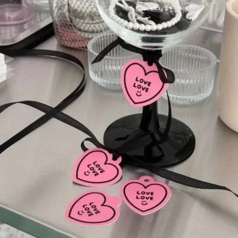 

Pink heart-shaped label, birthday gift, couple information card, gift packaging label, size 5.4X5.8 centimeters.