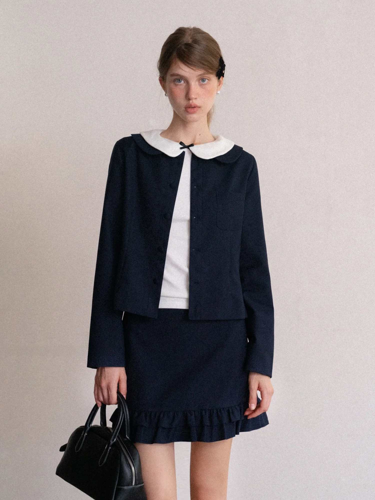 Eggka Coat Review: Why This French-Inspired Sweater & A-Line Skirt