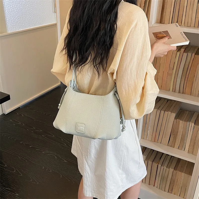 Women's PU Leather Crossbody Bucket Bag - usage example