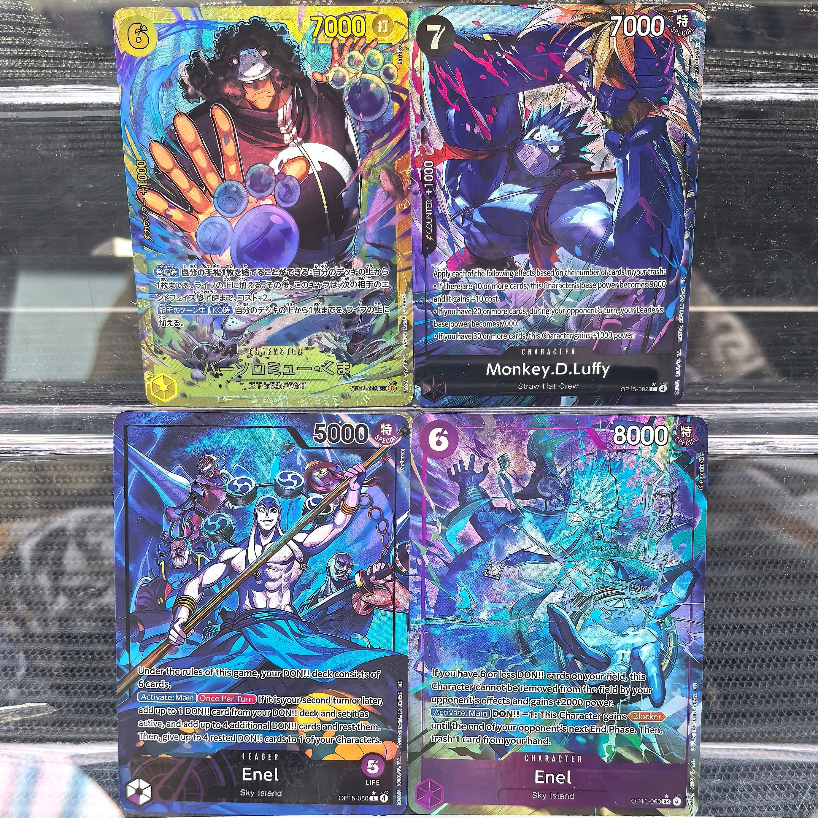 Colección de Cartas One Piece OP-15: Cartas Raras LEADER de Enel (Sky Island) + Cartas de Alta Potencia de Luffy y Bartholomew Kuma para Exhibición