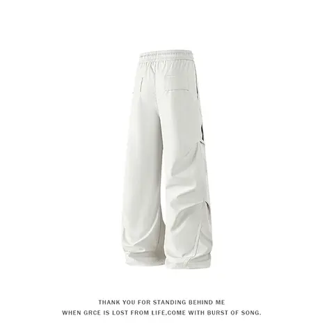Pantalones Cargo para hombre, ropa de calle holgada de pierna ancha con cordón en la cintura, pantalones informales ligeros a la moda, nuevos pantalones masculinos