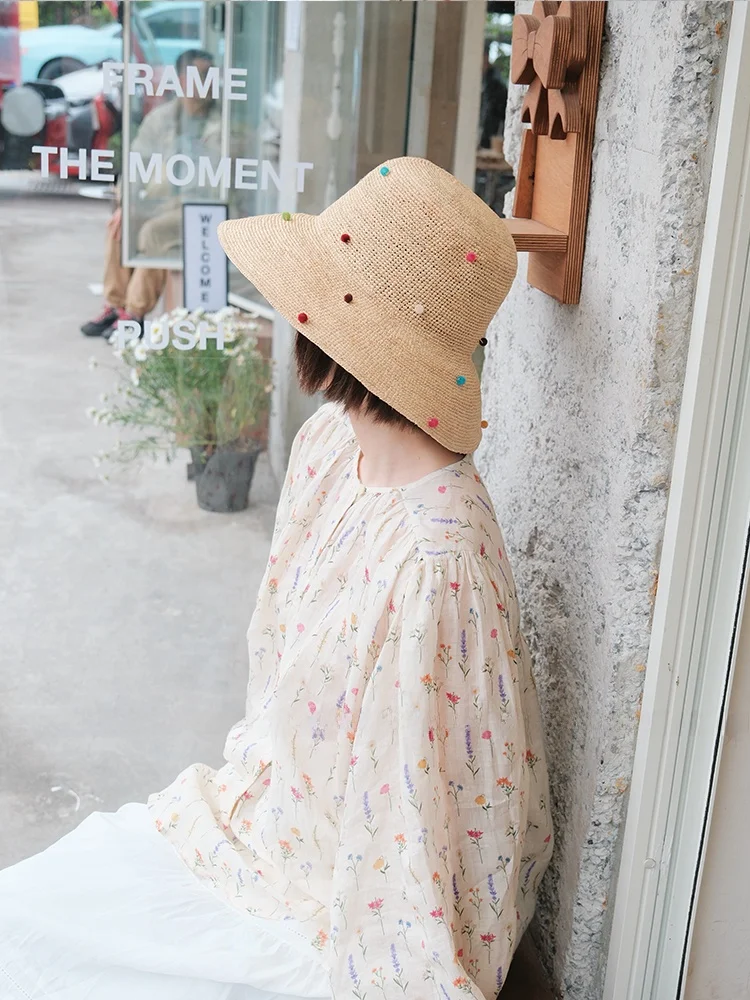 韓国スタイルのつば広わら編み釣り帽女性の夏の手作り日焼け防止帽子アウトドア旅行折りたたみ可能な天然ラフィア帽子