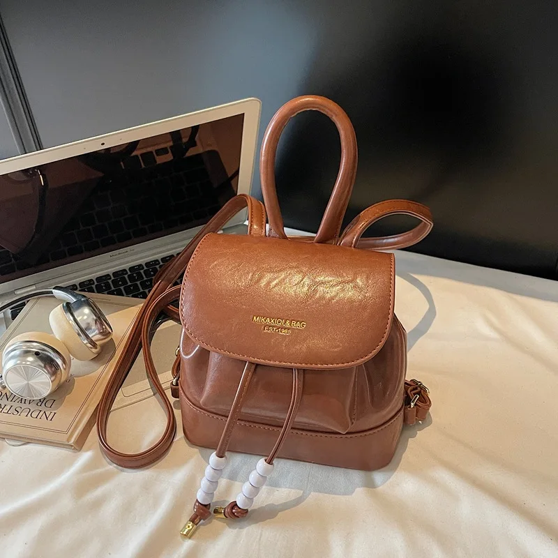 

2025 Новая плиссированная женская сумка на шнурке, небольшой рюкзак для путешествий на выходе, простой корейский рюкзак