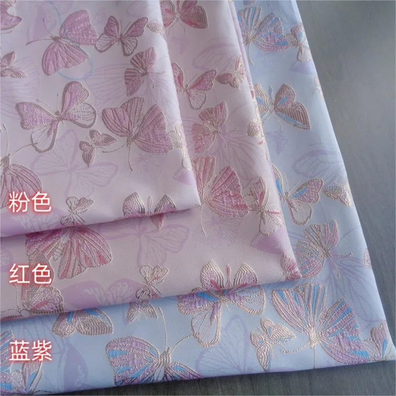 

Gold-threaded jacquard fabric with subtle embossed patterns for a cotton-padded dress