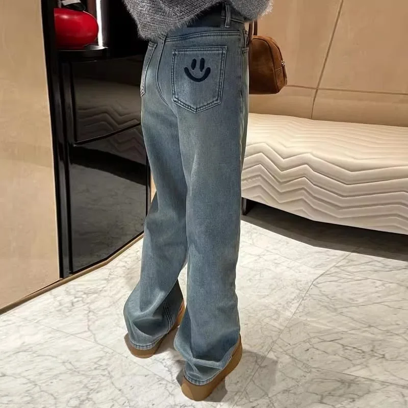Dżinsy damskie z haftem uśmiechniętej buźki, pluszowe, grube, z szerokimi nogawkami, jesienno-zimowe, nowe, z wysokim stanem, codzienne, wyszczuplające, proste spodnie.