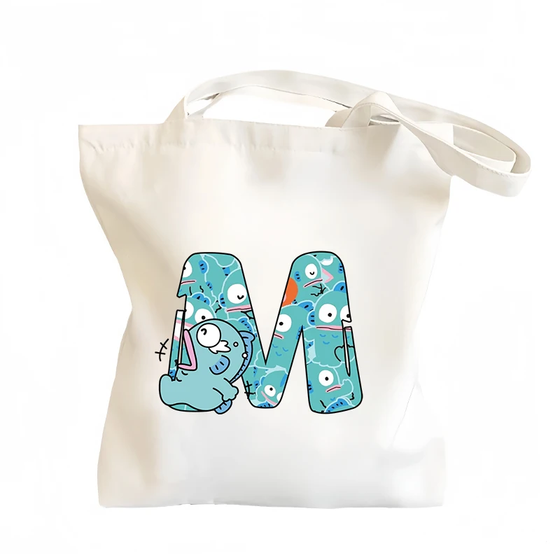 

Новая женская парусиновая сумка-тоут с английскими буквами аниме Hangyodon A-Z Kawaii, повседневная сумка на плечо с героями мультфильмов, большая вместительная дорожная сумка