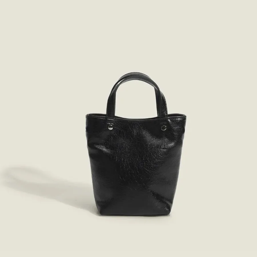 

Summer new Korean advanced handheld silver simple oil waxed leather mini bag texture senior bucket shoulder crossbody bag