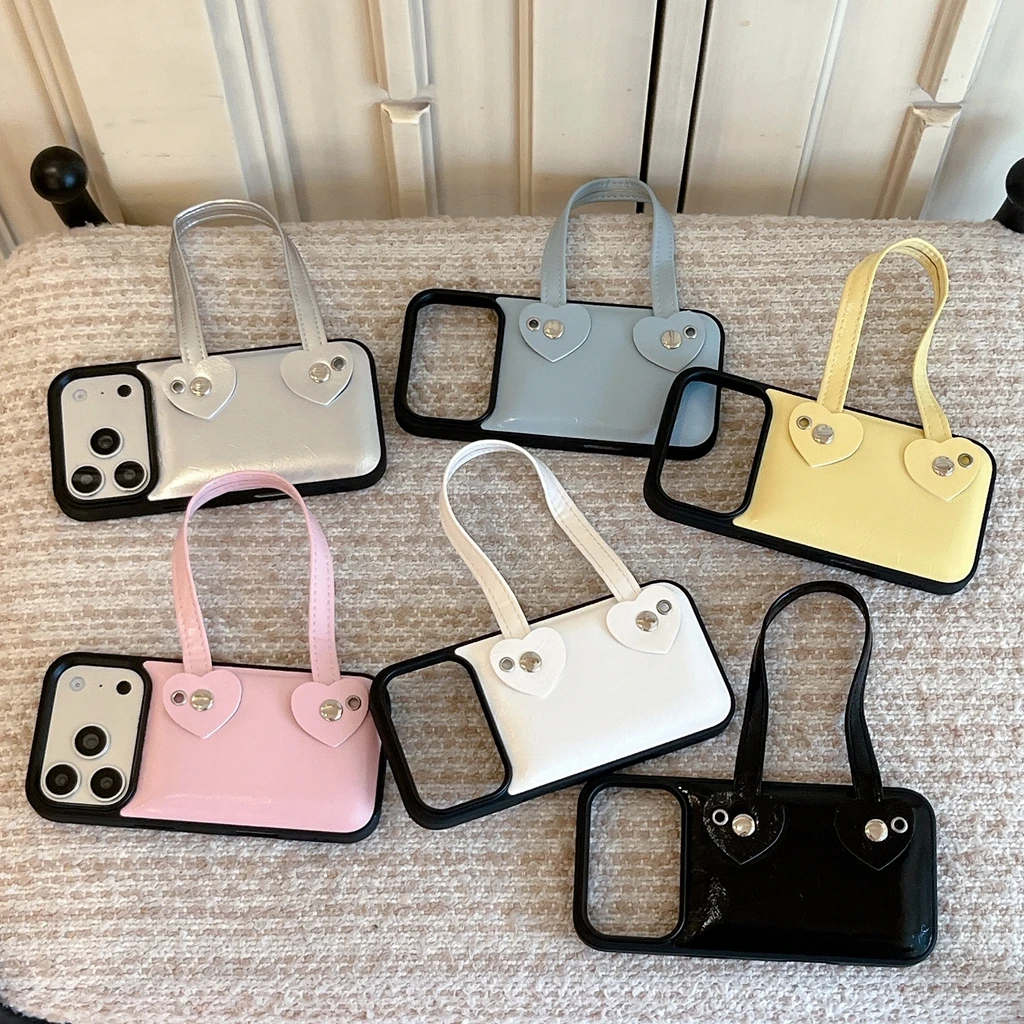 

Fashion Creative Heart Rivet Hand Wrist Strap Faux Leather Shockproof Protective Phone Cover Case for iPhone 17 16 15 Pro Max