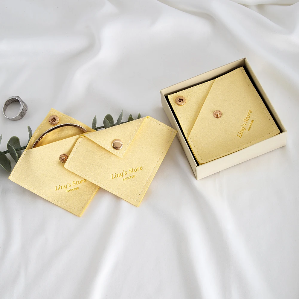 100 pçs amarelo personalizado triângulo jóias snap saco brincos anel pulseira chaveiro colar de cristal batom cílios embalagem