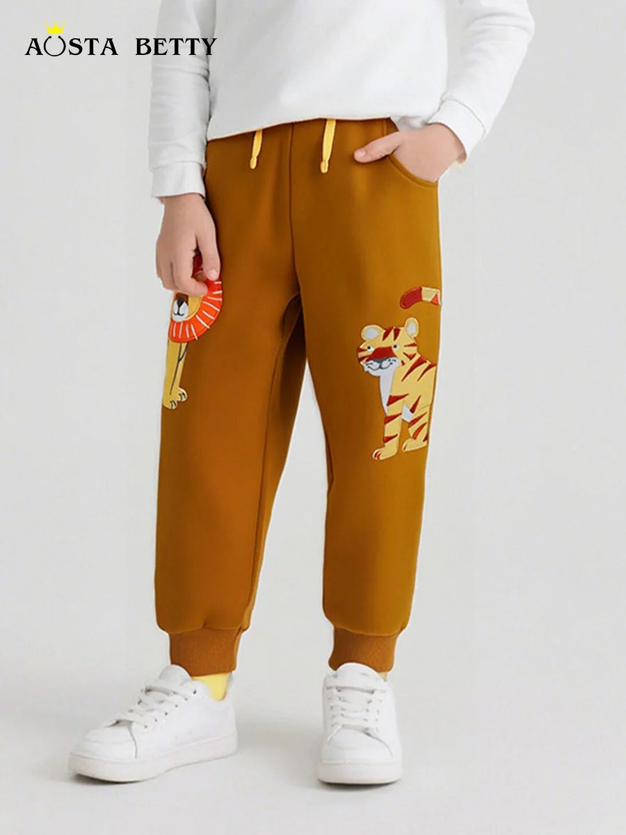 Europe and America fashion children's trousers autumn new boys' sweatpants cartoon lion embroidered children's trousers.