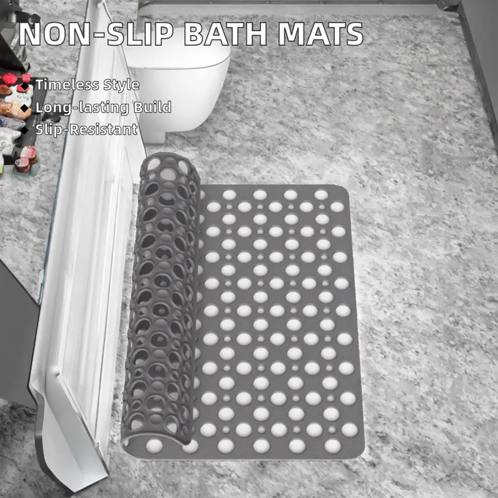 White 3D anti-slip bath mat with suction cups and massage bumps on wet floor.