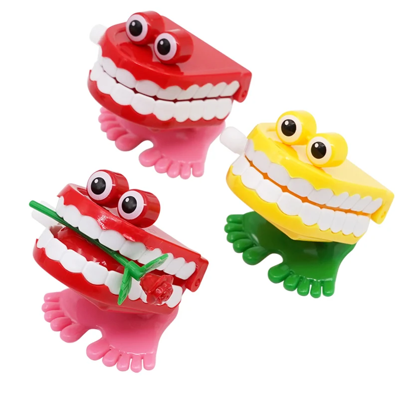 1pc regali a forma di denti novità Jumping Walking Toy natale Halloween Kids Tooth Gift Dental Children Clinic decorazione del Desktop