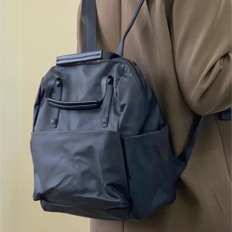 حقيبة ظهر JIAERDI من النايلون الأسود للنساء مقاومة للماء وخفيفة الوزن وسعة كبيرة حقيبة يد عصرية متعددة الاستخدامات للتنقل اليومي #3