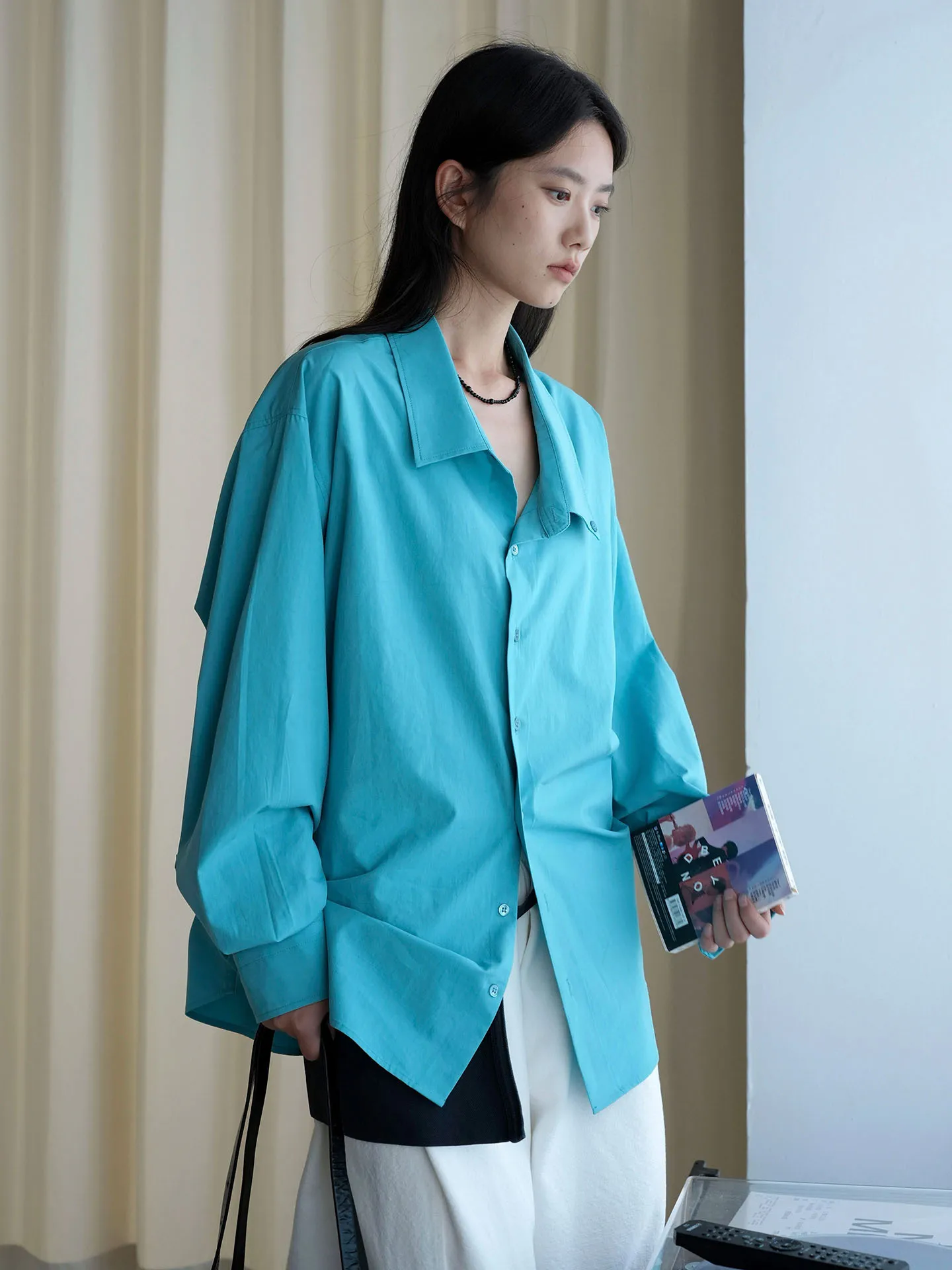 Autumn new casual solid color lapel long sleeved loose long shirt