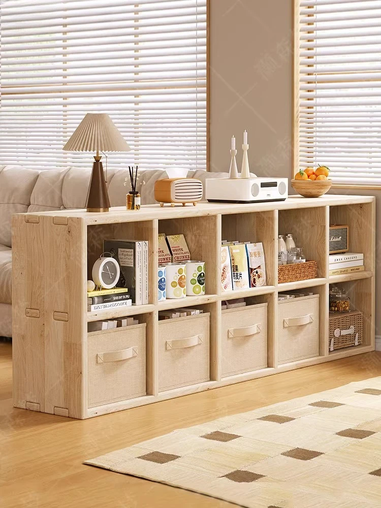 Solid wood bookshelf floor-to-ceiling low cabinet shelf against the wall living room