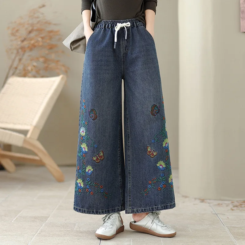 Hoge kwaliteit dames denim broek herfst en winter 2026 etnische stijl bloem geborduurde denim wijde pijpen broek gezellige broek