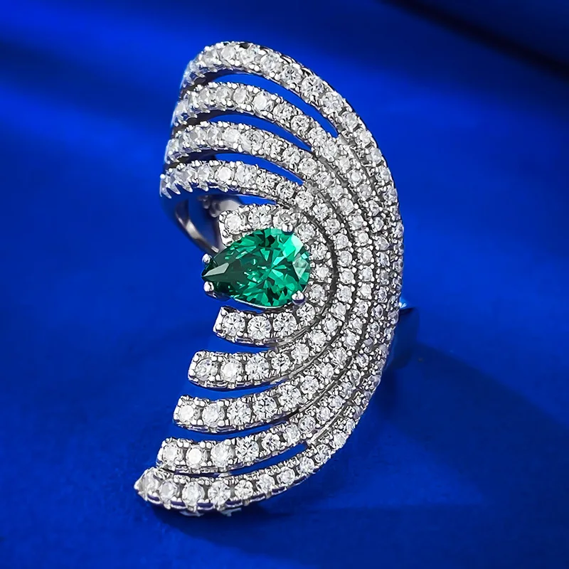 

The 2024 new S925 sterling silver European and American luxury set 5 * 7 pear shaped emerald ring is selling well