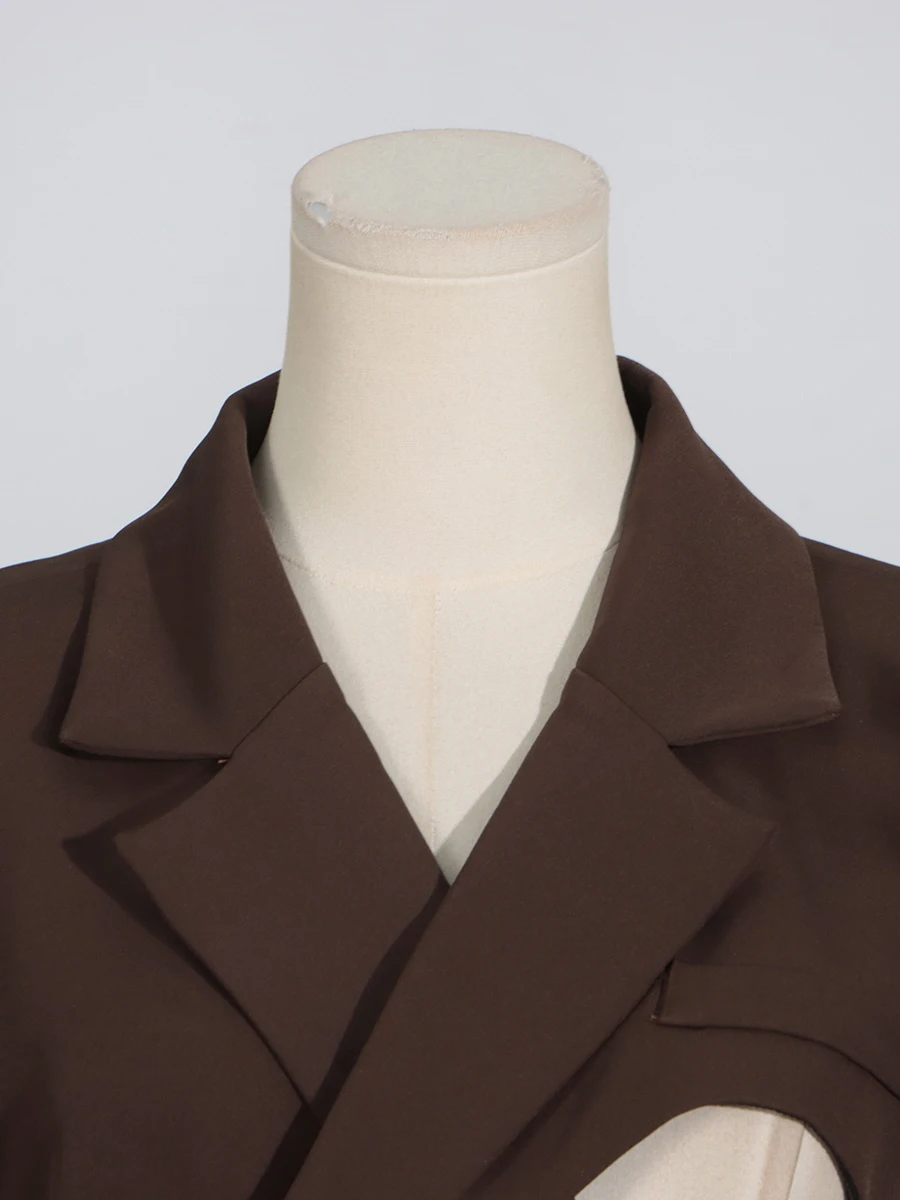 VGH Asymmetrical Hollow Out Chic Blazer For Women Lapel Long Sleeve Patchwork Button Slimming Jackets Female Fashion Style New