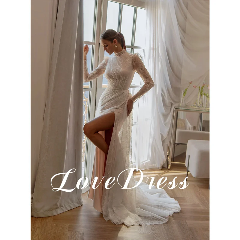 Love Modern Abito da sposa a sirena in pizzo con collo alto Abito da sposa avorio a maniche lunghe Abito da sposa sexy con spacco laterale alto Bottoni senza schienale Lunghezza pavimento