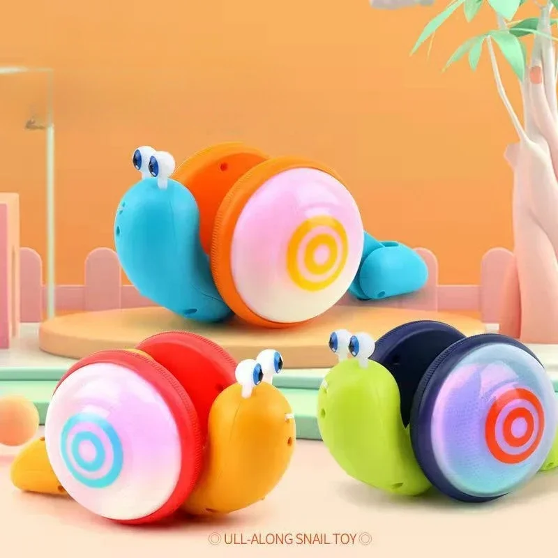 Pull String Cartoon Snail Car toy Baby Learn to Crawl Reptile Drag Pull Toy with Light Music Early Education Toys for Children