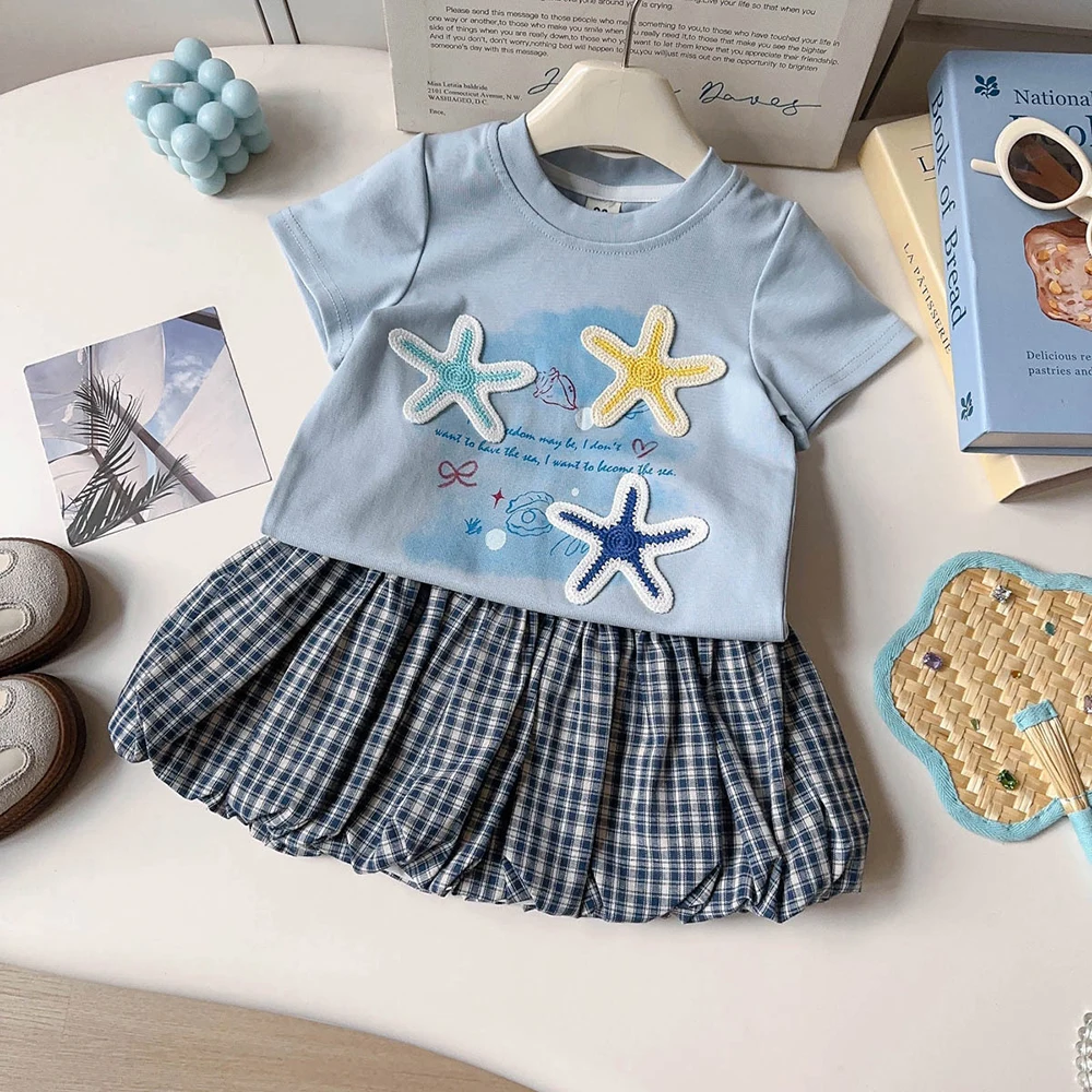 

Детский летний комплект для девочек из 2 предметов: футболка с аппликацией в виде морской звезды + синяя клетчатая юбка-баллон, новинка 2026 года, детские комплекты одежды
