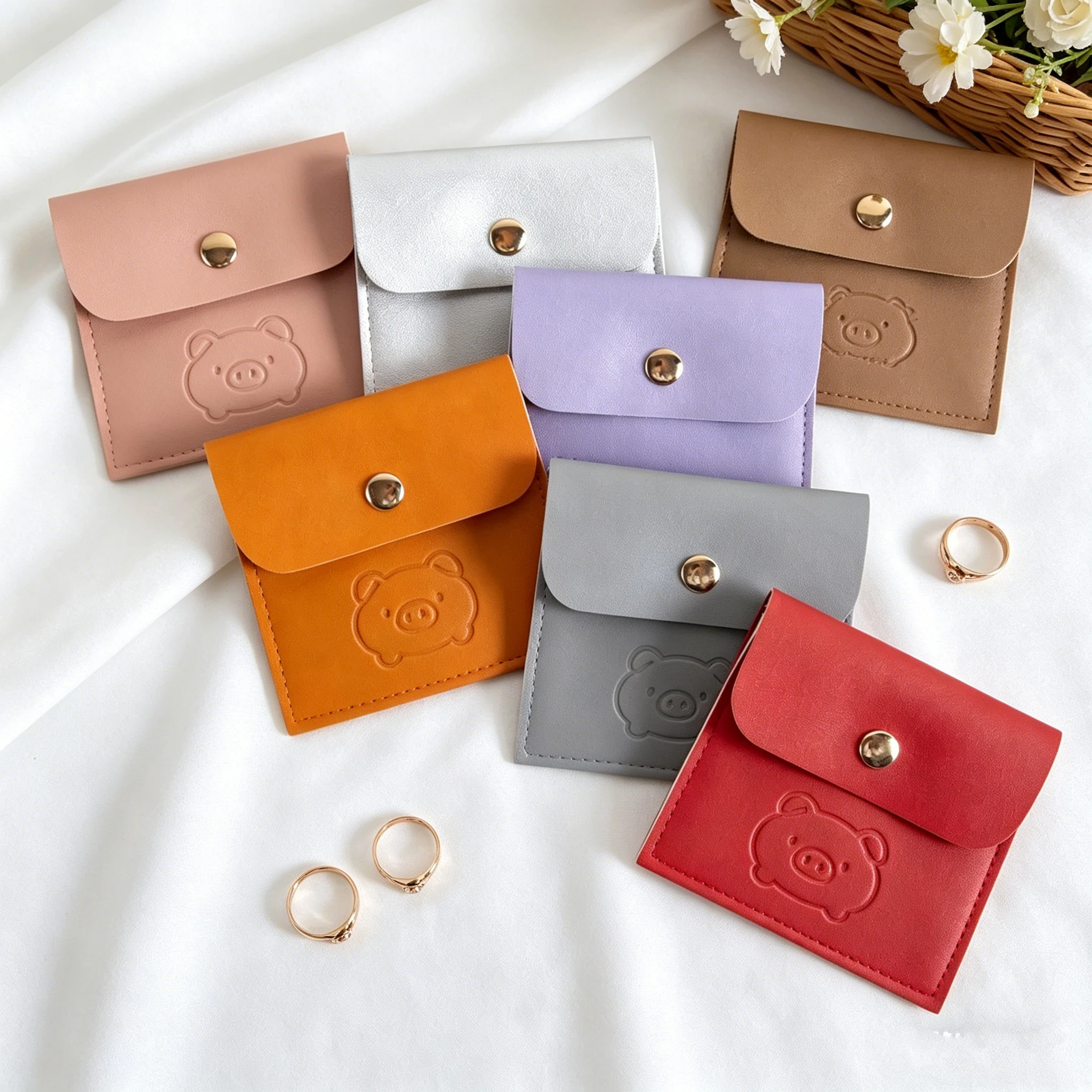 50pcs-personalized-embossed-soft-leather-jewelry-gift-button-bags-earring-ring-stud-pearl-necklace-headset-purse-storage-pouches