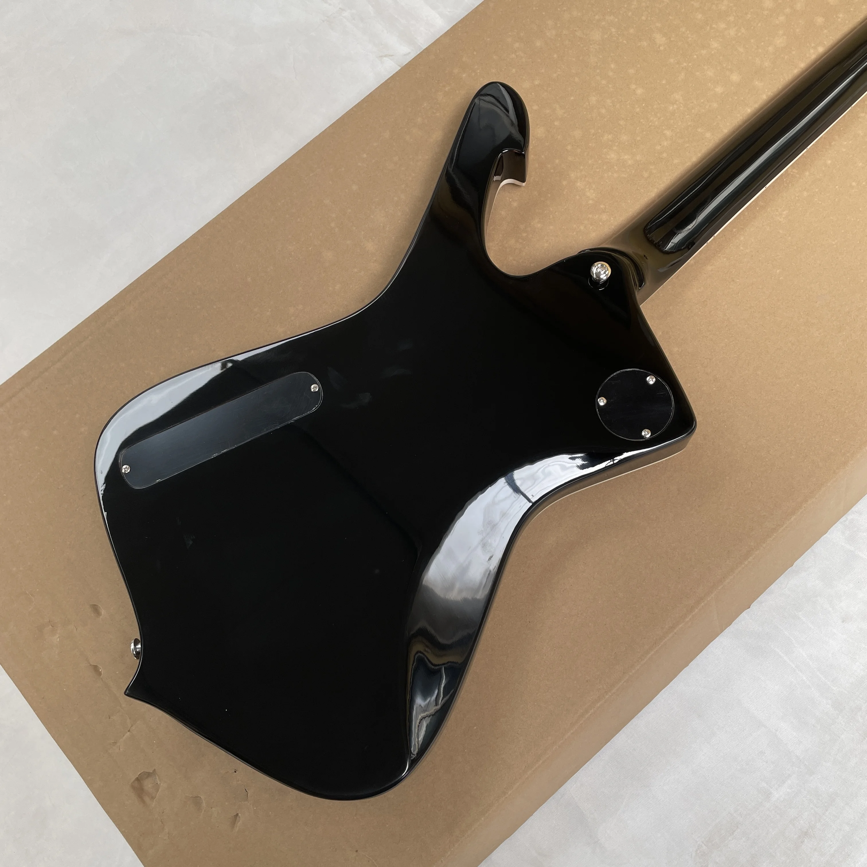 Pure black glossy electric guitar with high-grade pickups and rosewood fingerboard guitars. An advanced rock-style guitarra view 6