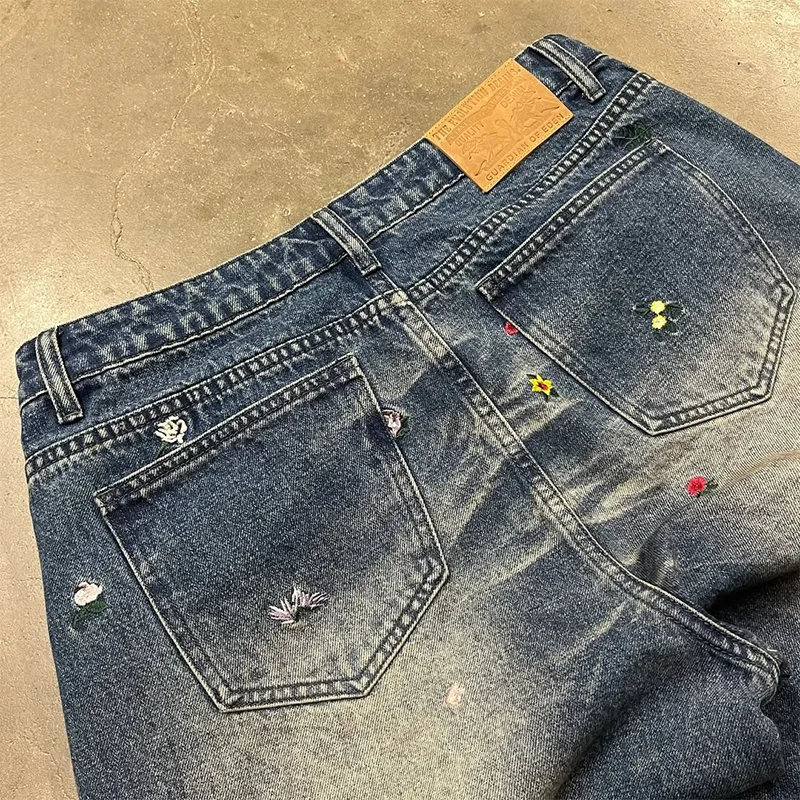 Y2K Jeans lavati vintage con motivo floreale artistico ricamo a vita alta jeans larghi a gamba larga tendenza uomo donna moda streetwear