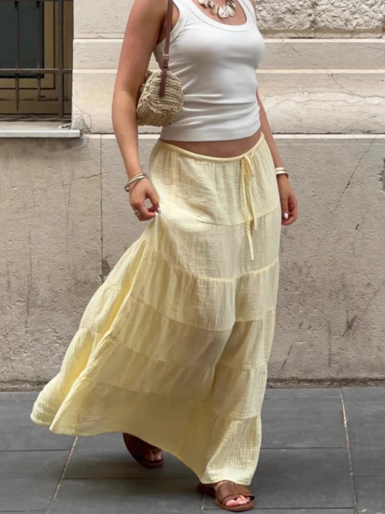 Tsiisd Casual Yellow Cake Long Skirt Women Loose lace-Up Solid Pleats Patchwork Commuting Spring Outfit Female 2026 Maxi Skirts