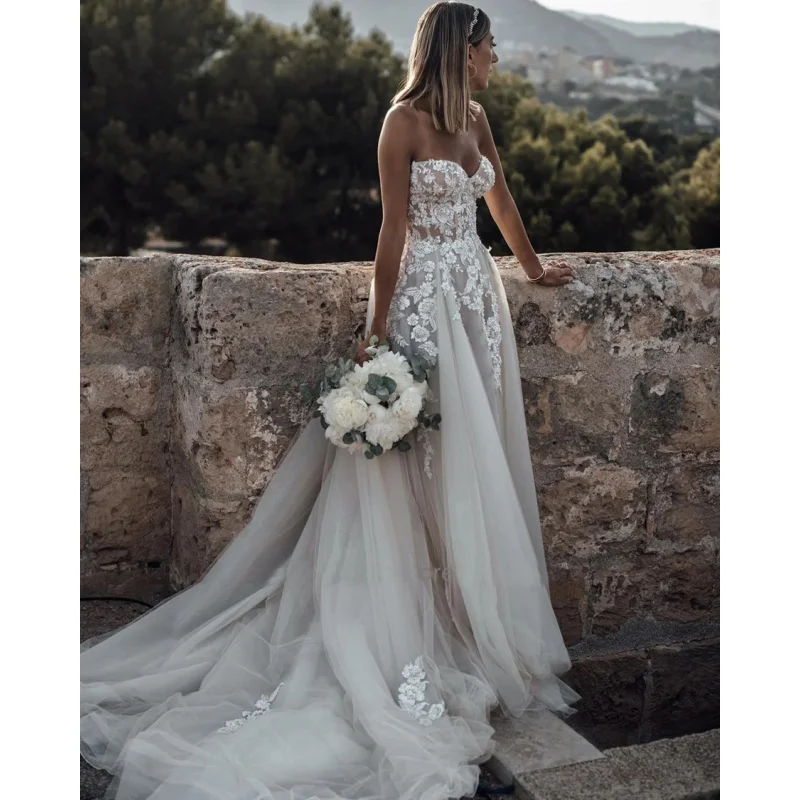 Customized Breathtaking Strapless Wedding Dress Featuring Stunning Crystals Lace Appliques and Flowy  Silhouette Bridal Dress