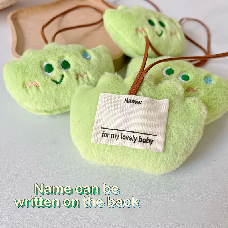 Cartoon Little Grass Squeaky peluche Anti Lost Name Sticker ciondolo creativo bambola di pezza portachiavi zaino Charms regali