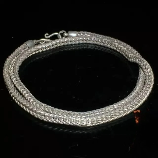 

Vintage silver necklace, with personalized ethnic style. It's silver item from the silver workshop, a gift and a neck ornament.