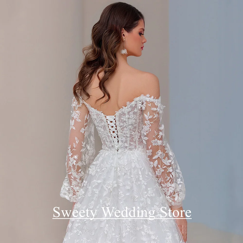 فساتين زفاف دانتيل رائعة مخصصة بأكمام منتفخة ورقبة على شكل V سويب تراين تول لامع مشد فستان زفاف للعروس