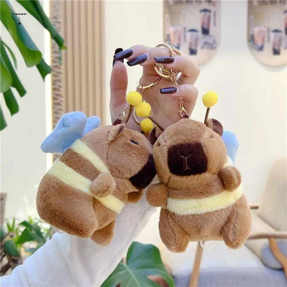 

Creative Soft Capybara Key Ring Funny Pulling Rope Wing Flutter Doll PP Cotton Cross Dressing Cartoon Animal Keychain Girls