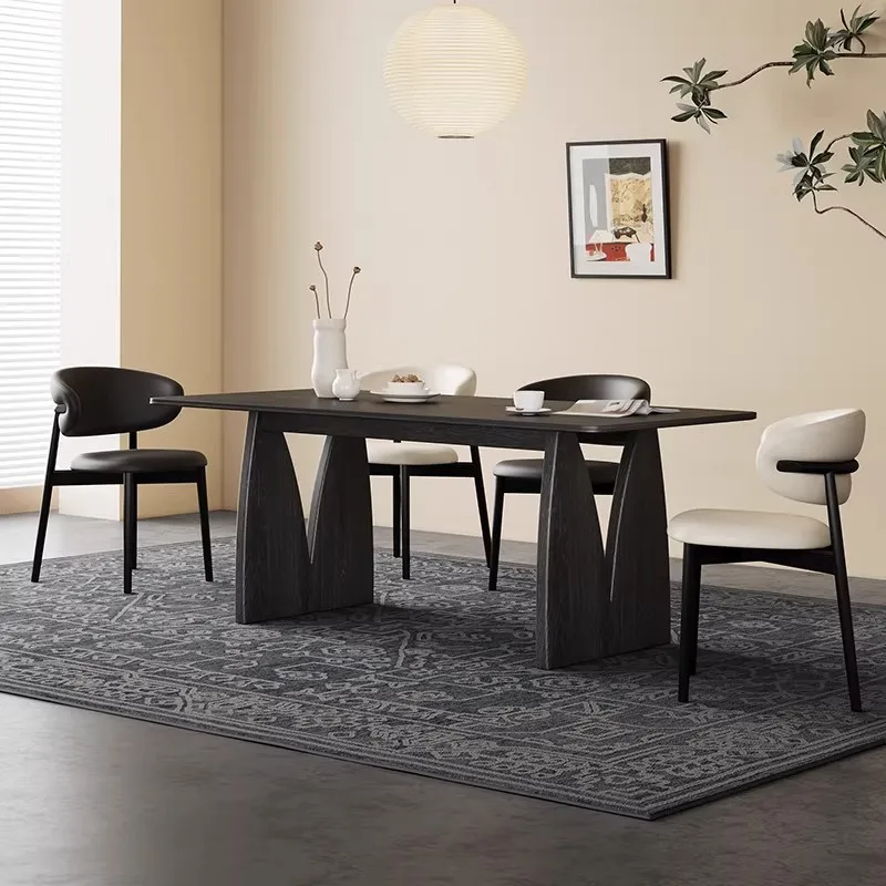 Medieval solid wood rock slab dining table and chair combination, modern simple home 2026 new rectangular black table