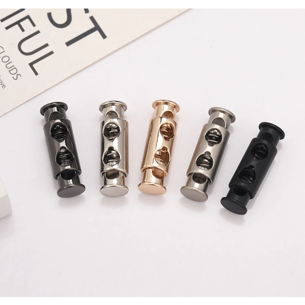 30 unidades de cierres de cordón de aleación metálica, 3 colores (Níquel, Negro, Oro), con dos orificios para cordón de 4mm - Stopper STP-017