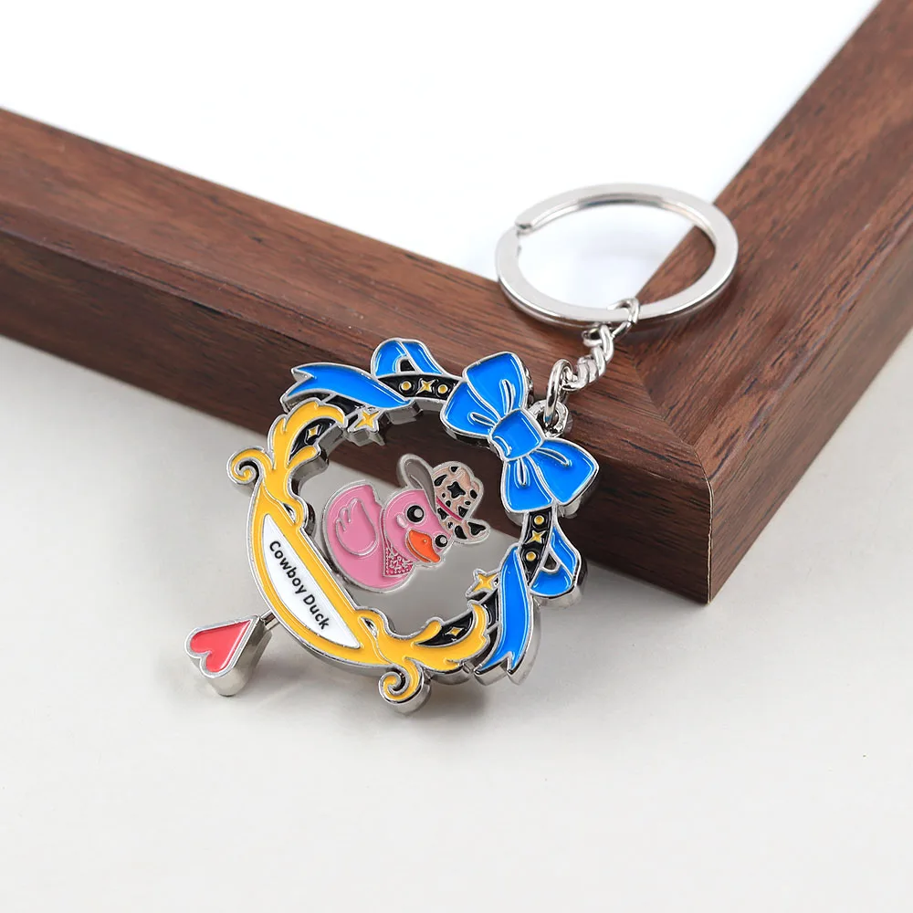 Lustiger rotierender Cowboy-Enten-Schlüsselanhänger, doppelseitig drehbarer rosa Enten-Schlüsselring, Kawaii-Tier-Metallanhänger, Schmuck für Rucksack und Tasche – Detail 7