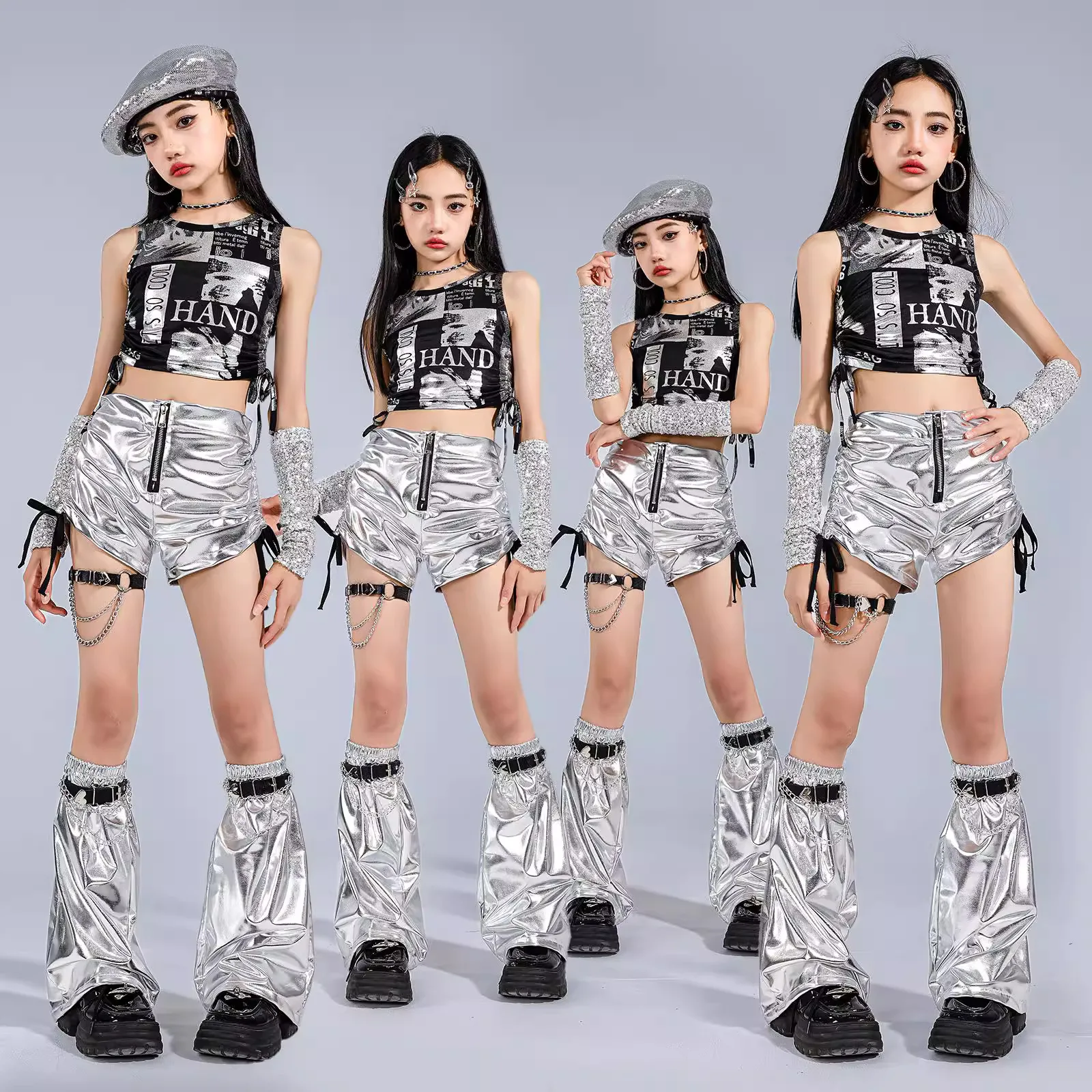 Ropa de Hip Hop Kpop para chico, camiseta sin mangas corta con cordones y estampado negro, pantalones cortos metálicos plateados con lazo lateral para niña, traje de baile callejero