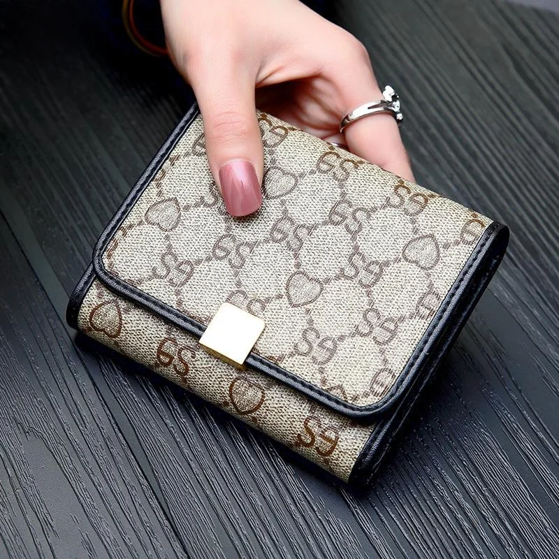hong-kong-2026-nouveau-portefeuille-court-femme-multifonctionnel-en-cuir-veritable-petite-bourse-a-monnaie-pochette-a-trois-fermoirs-porte-cartes-tendance