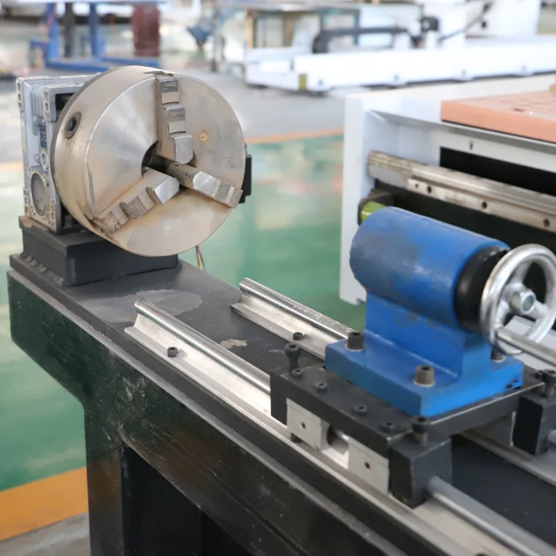 The 1325-type CNC wood carving machine for furniture manufacturing features a side rotation shaft and laser marking capability.