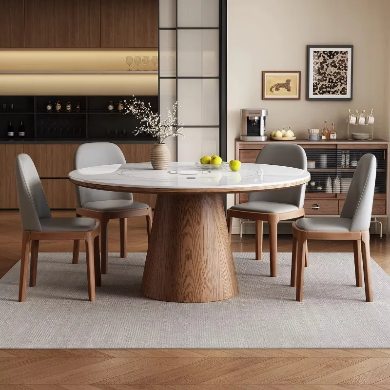 

Роскошный многофункциональный обеденный стол с индукционной плитой, ножками из массива дерева и столешницей из камня.