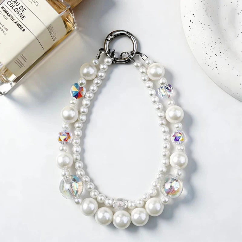 

Luxury double-layer pearl phone strap with iridescent crystals, phone chain, bag and car decoration, anti-lost wrist strap
